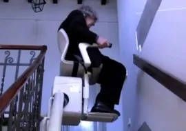  Don Giorgio et son fauteuil monte-escalier Vimec Capri